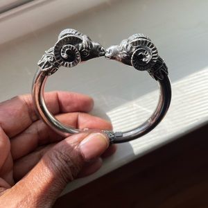 Sterling silver dual ram’s head hinged bracelet
